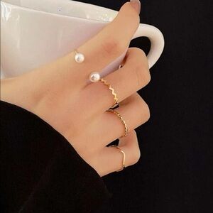 Gold 4pc faux pearl ring set